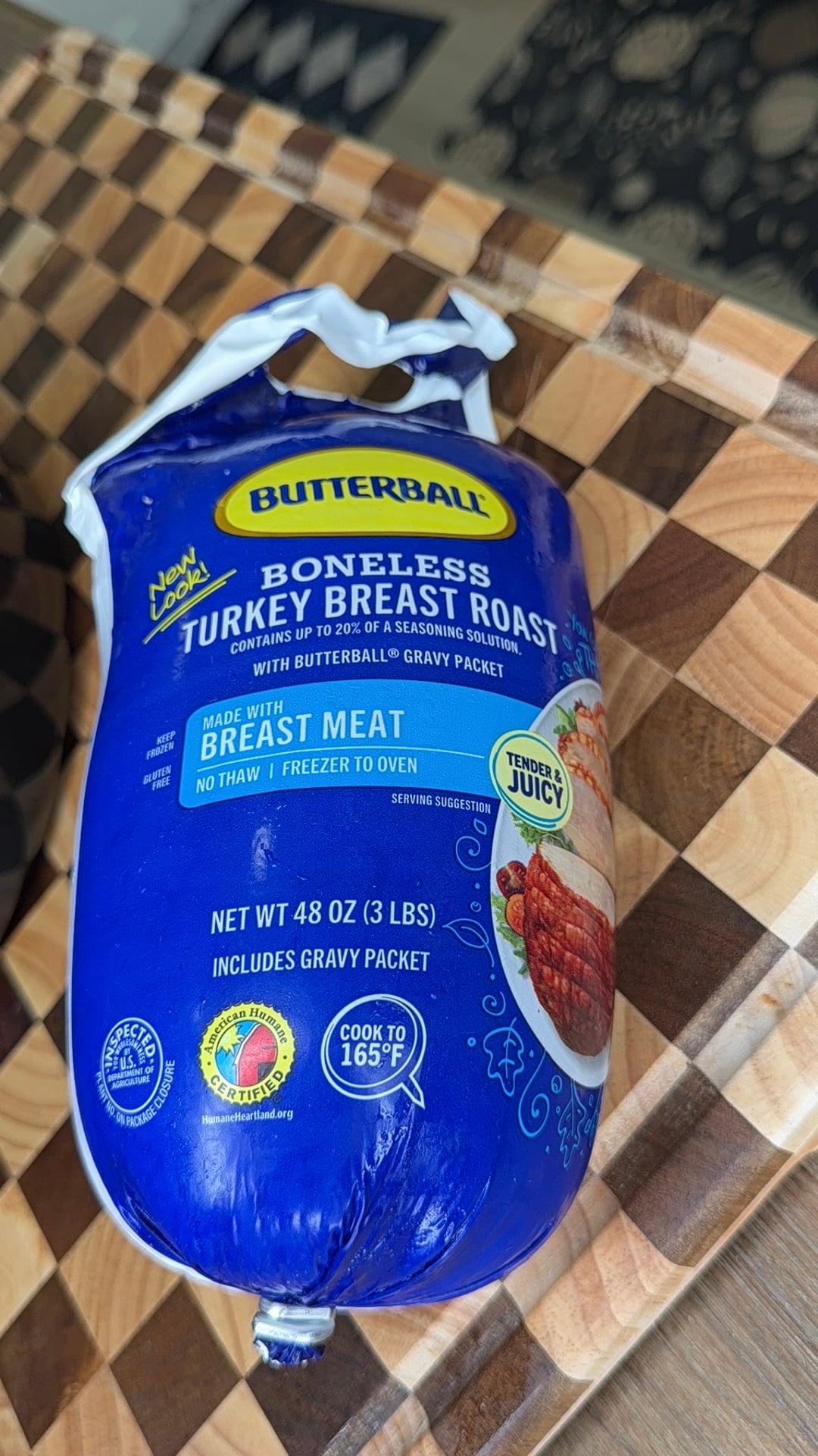 Butterball 48-ounce frozen boneless turkey breast roast with gravy packet.