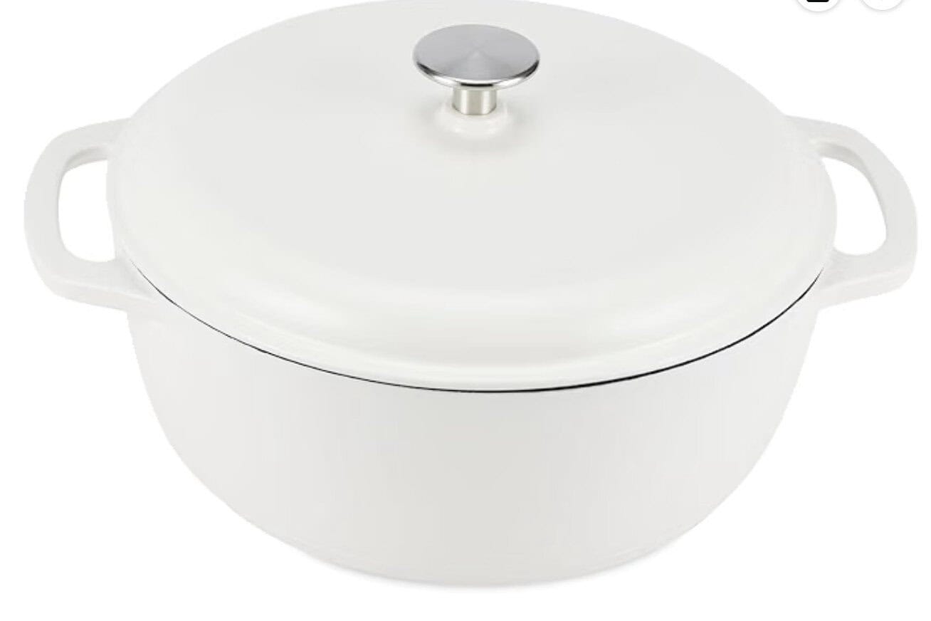 White enameled cast iron Dutch oven with a lid and a metallic knob handle.