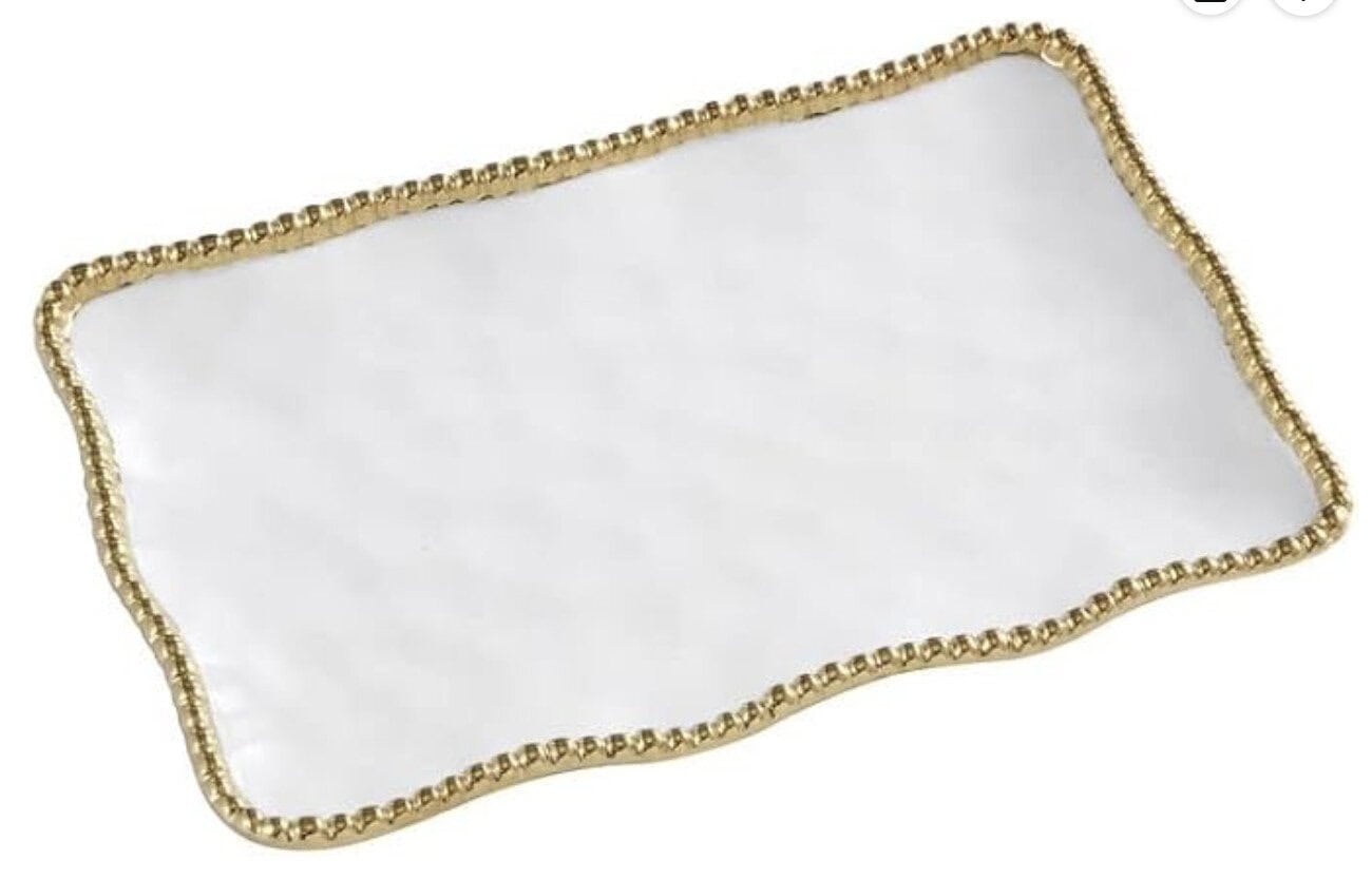 Rectangular white tray with a textured surface and a beaded gold rim.